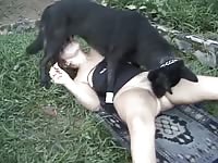 Black dog makes slut cum with his tongue in outdoors animal porn