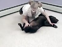 Hot beastiality lover dressed as a schoolgirl sucks her dogs little cock