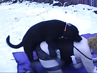Dog fucks owner in the snow - zoophilia