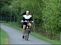 Blonde nun goes commando while riding a bike