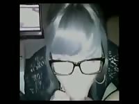 Crossdressing Secretary Gives Amateur Blowjob on Webcam