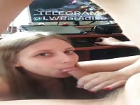 Sister is sucking brother's dick while he is playing